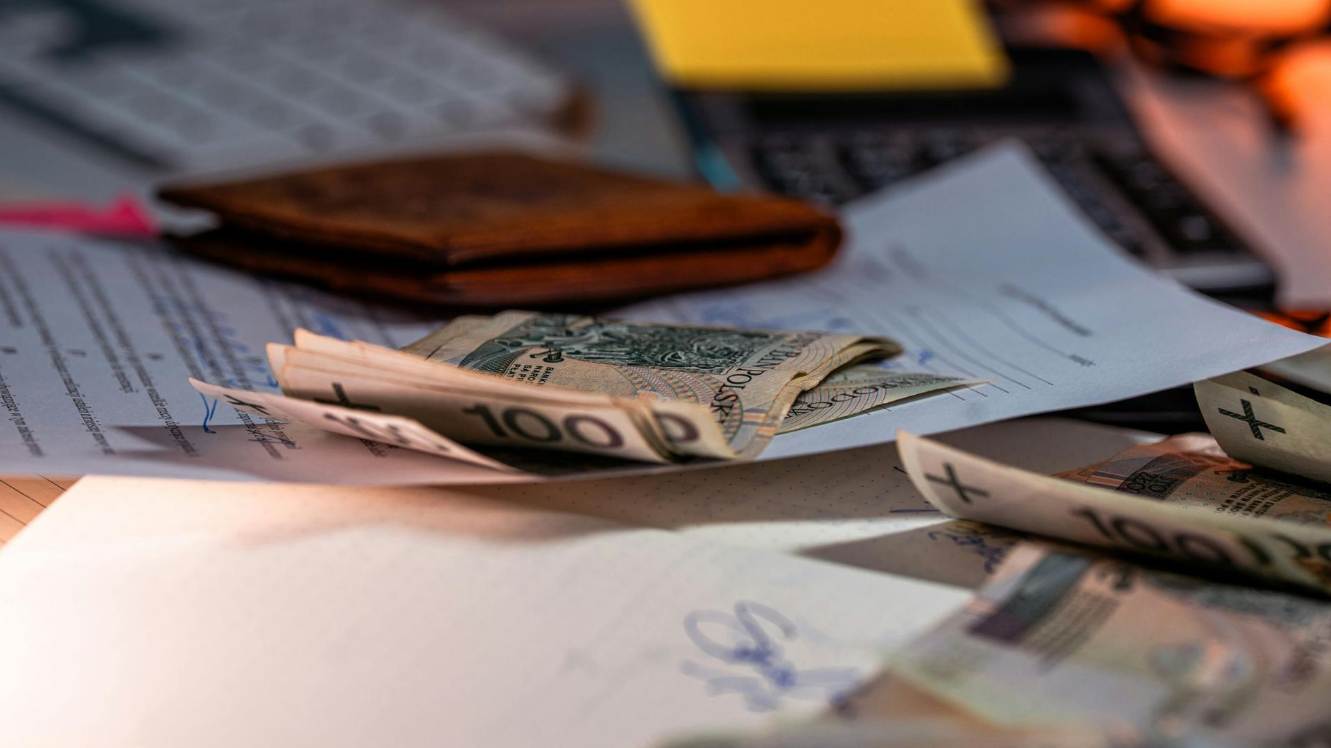 Cash and documents on a table